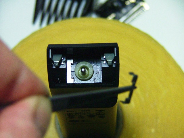 Once the clips have been unhooked, they will need to be removed using spring tweezers.