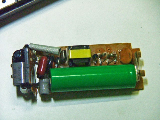 The rechargeable battery is AA size with metal terminals to be soldered