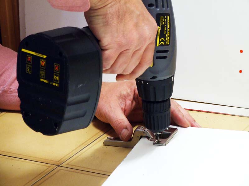 Make a hole with the drill bit before placing the screw