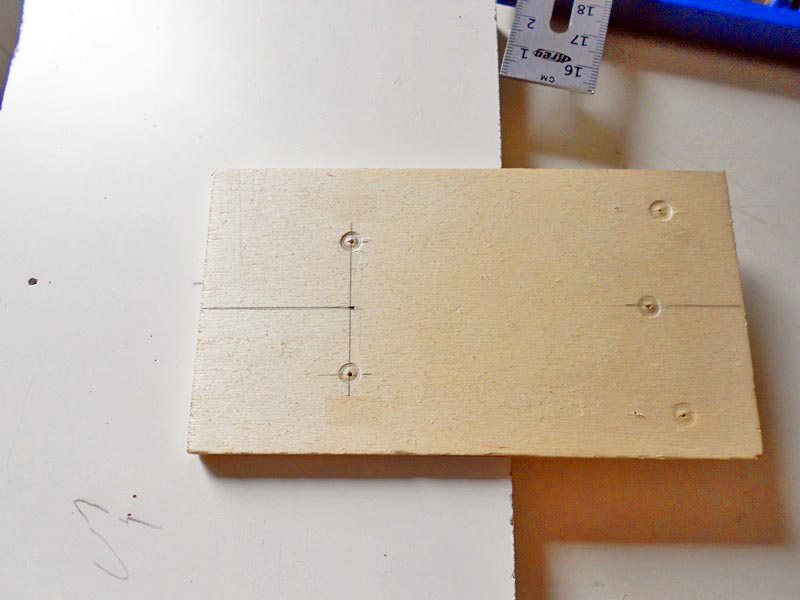 Using the template for the hinges on the side of the cabinet Using the template for the hinges on the side of the cabinet