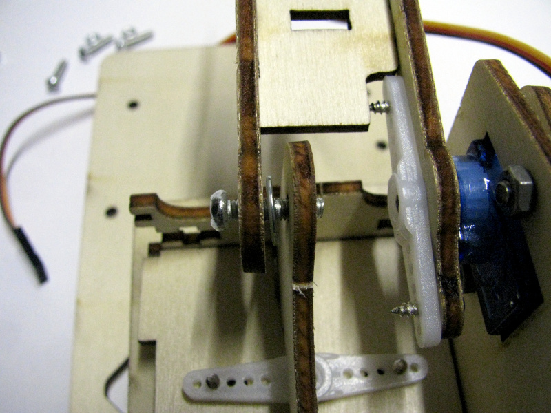 Joining the first segment of the robotic arm with the central base Joining the first segment of the robotic arm with the central base