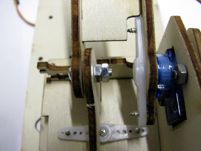 Lock the nut securing the arm to the fixed support base with a locknut Lock the nut securing the arm to the fixed support base with a locknut