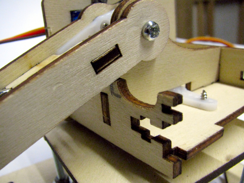 The first segment of the arm hits the front of the support The first segment of the arm hits the front of the support