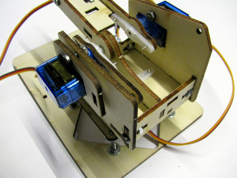 Attaching the motion servo base of the second segment of the robotic arm Attaching the motion servo base of the second segment of the robotic arm