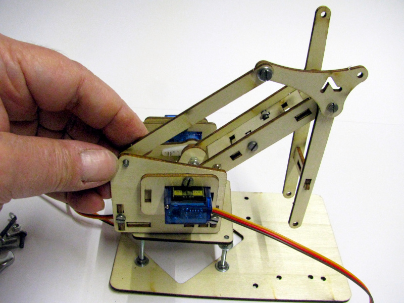 Assembly of the first transport lever of the mechanical arm movement Assembly of the first transport lever of the mechanical arm movement