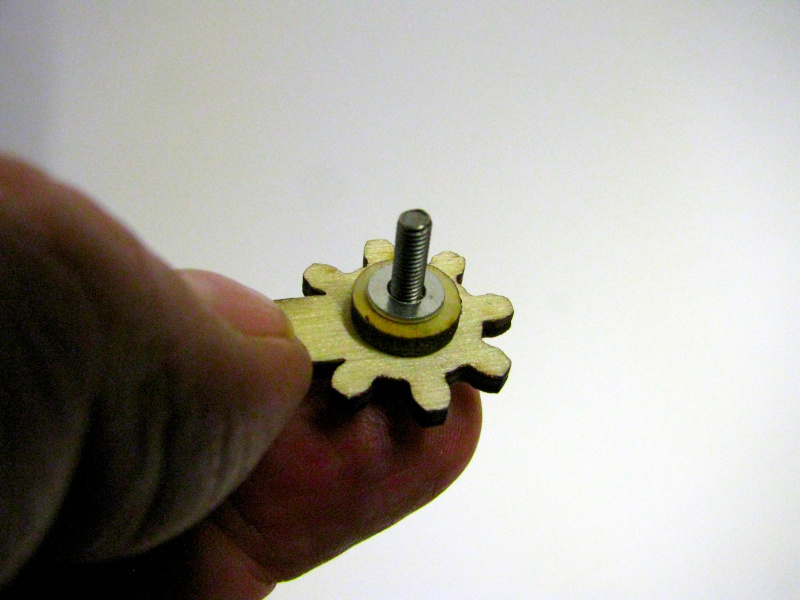 A screw, a spacer and a metal washer will be inserted into the hole in the claw A screw, a spacer and a metal washer will be inserted into the hole in the claw