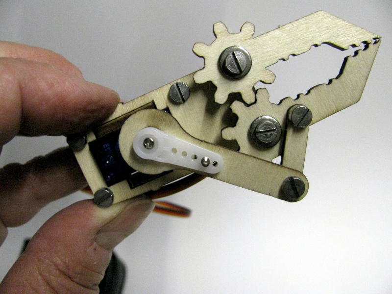 Connecting the linkage of the robotic gripper claw movement Connecting the linkage of the robotic gripper claw movement