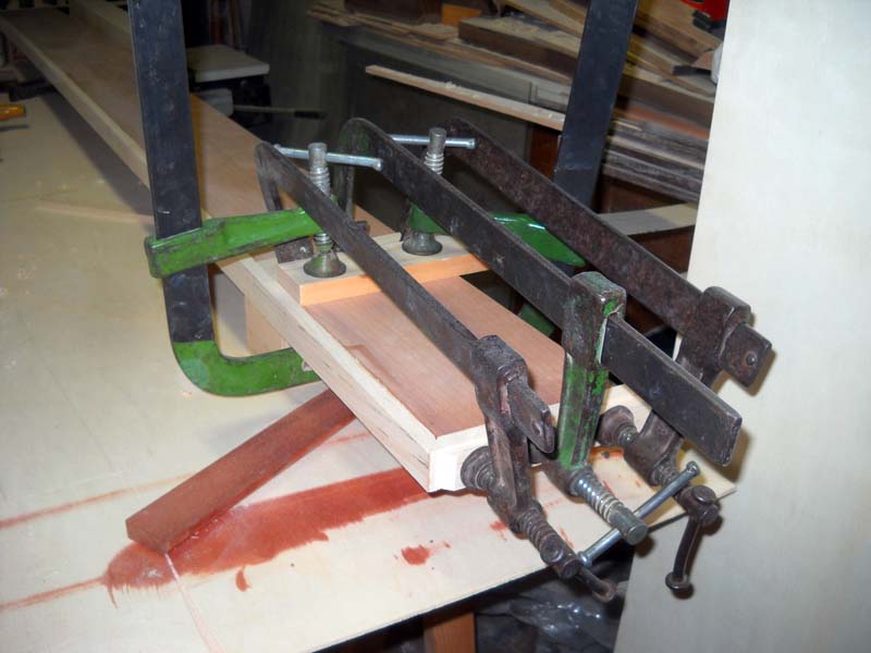 A board stuck crosswise was used to pull the clamps
