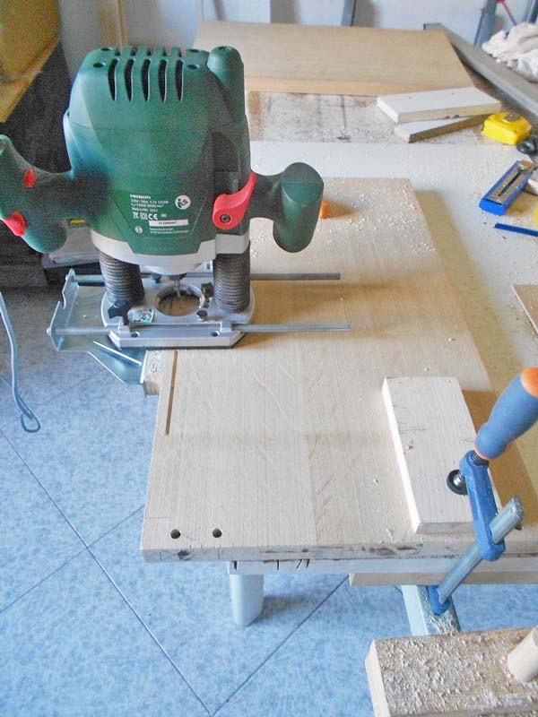 Preparazione dei fori per la spinatura e della canalina per il fondo