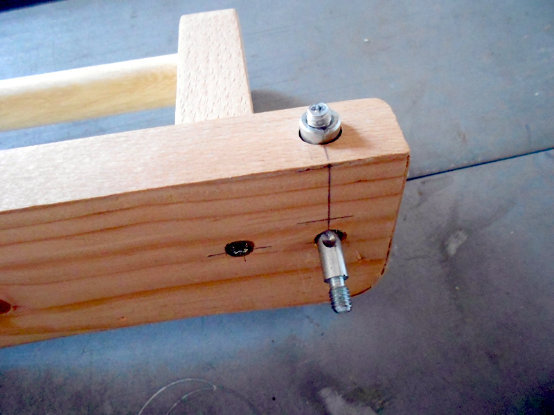 Fissaggio del sistema perno/barilotto all'interno della cimosa